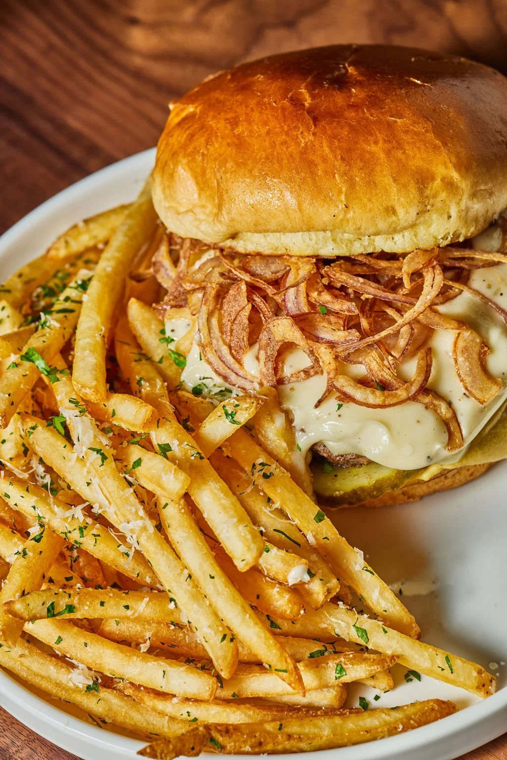 Smash burger with garlic parmesan fries at Bunkers